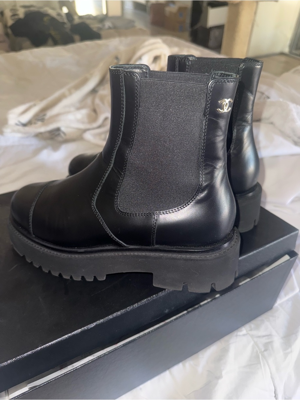 CHANEL Black Leather Chelsea Boots with Silver CC Accent